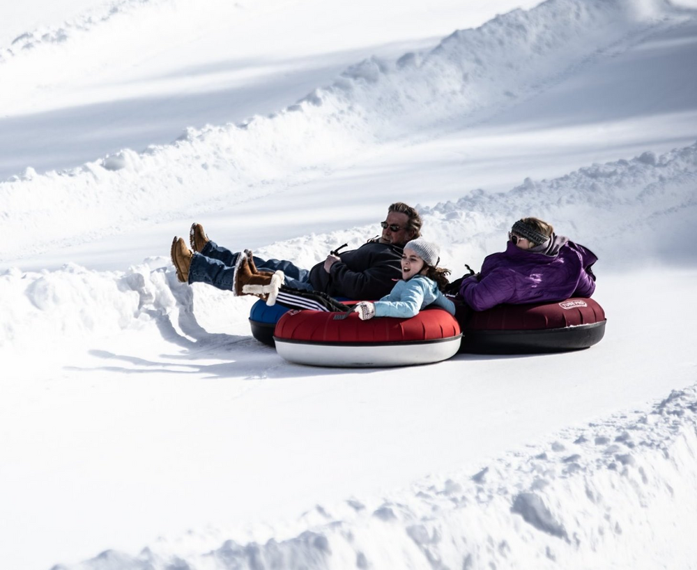 a person lying on the snow